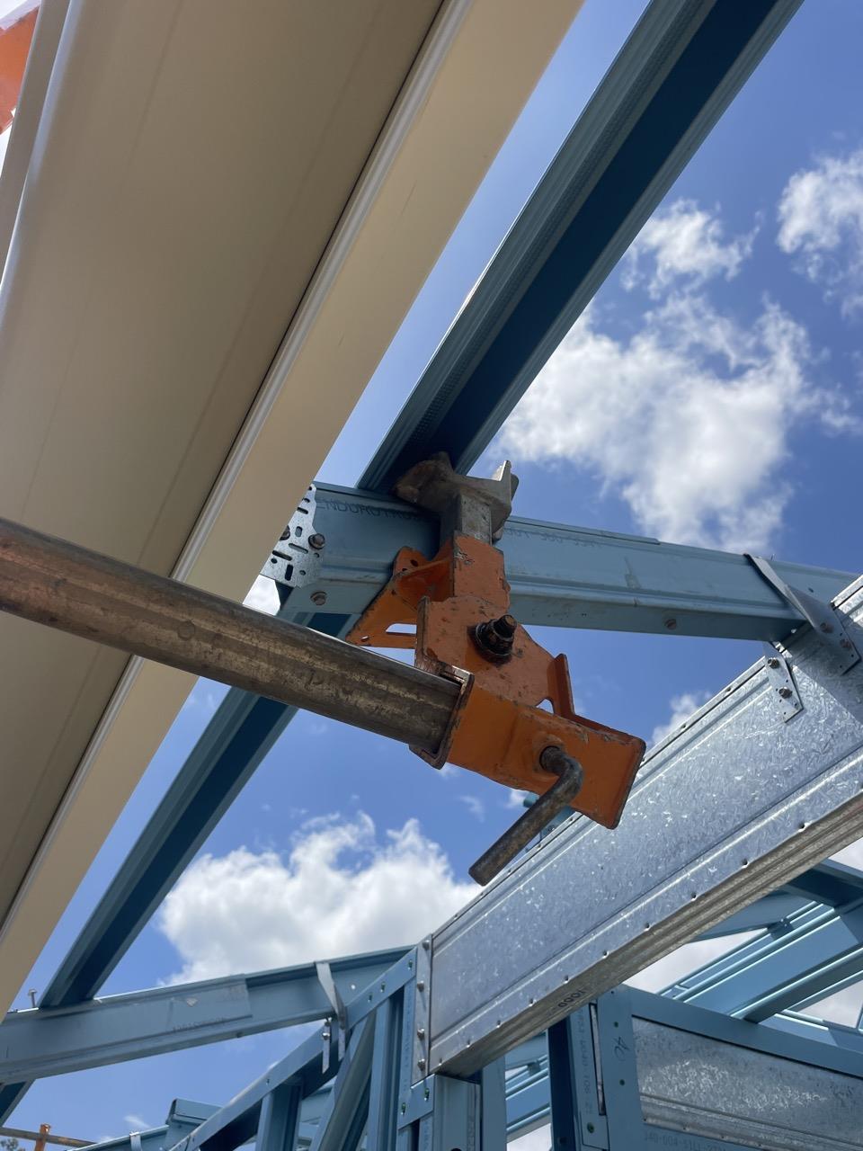 Have clamps been attached to steel frame studs or supaloc trusses? Yes