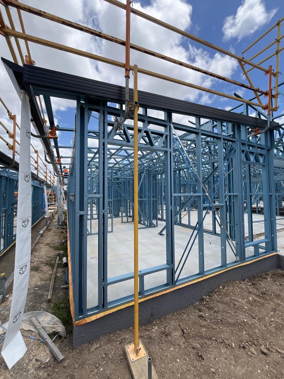 Have clamps been attached to steel frame studs or supaloc trusses? Yes