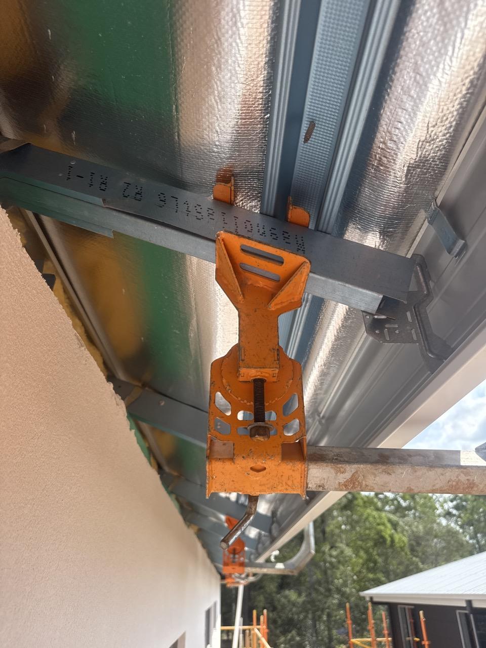 Have clamps been attached to steel frame studs or supaloc trusses? N/A