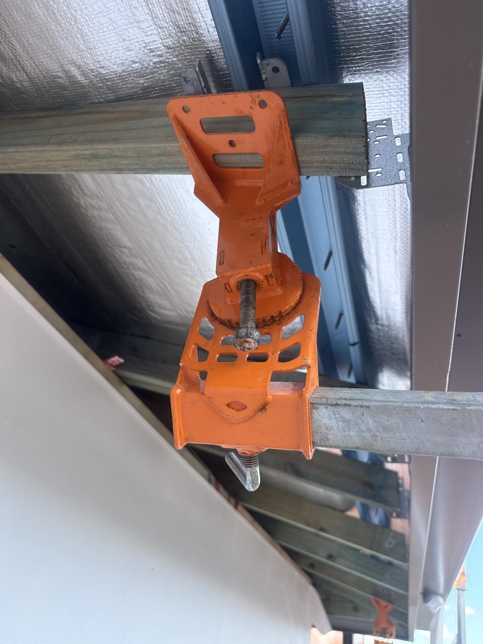 Have clamps been attached to steel frame studs or supaloc trusses? N/A