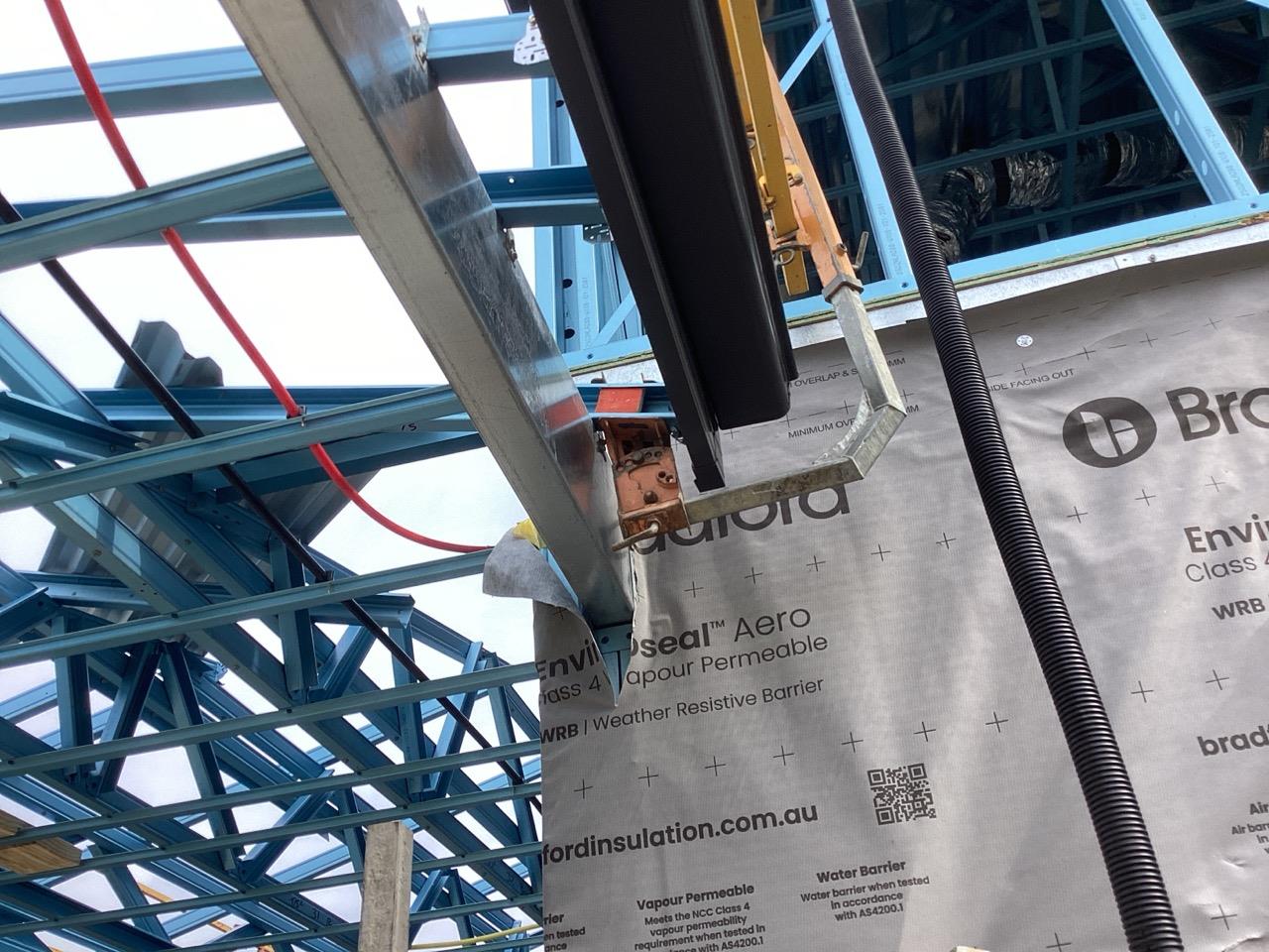Have clamps been attached to steel frame studs or supaloc trusses? Yes